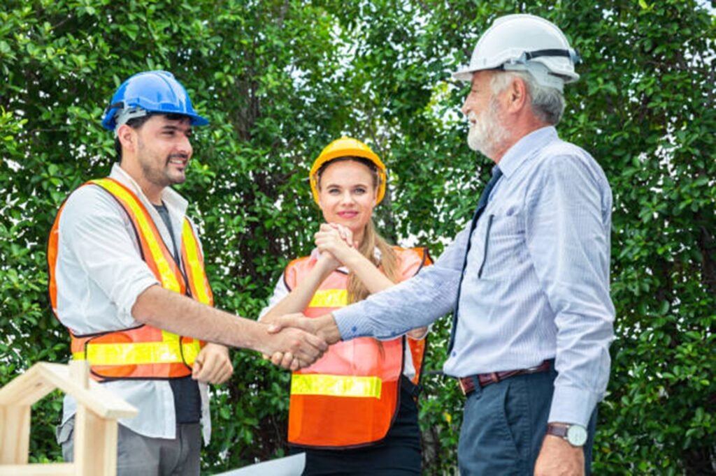 Professional tree service team discussing project details with homeowner after tree trimming job in Cuyahoga Falls, OH